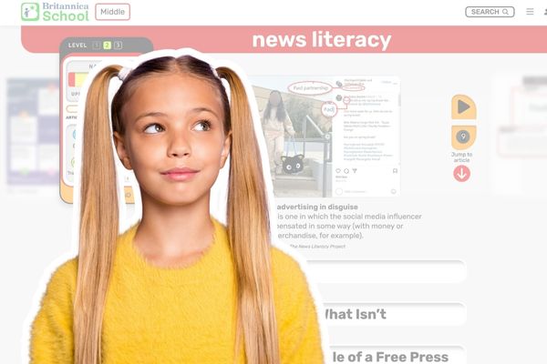 Girl with pigtails in yellow sweater