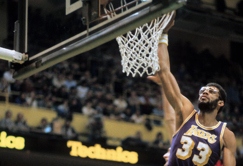 Kareem Abdul Jabbar scoring an slam dunk playing for the Los Angeles Lakers
