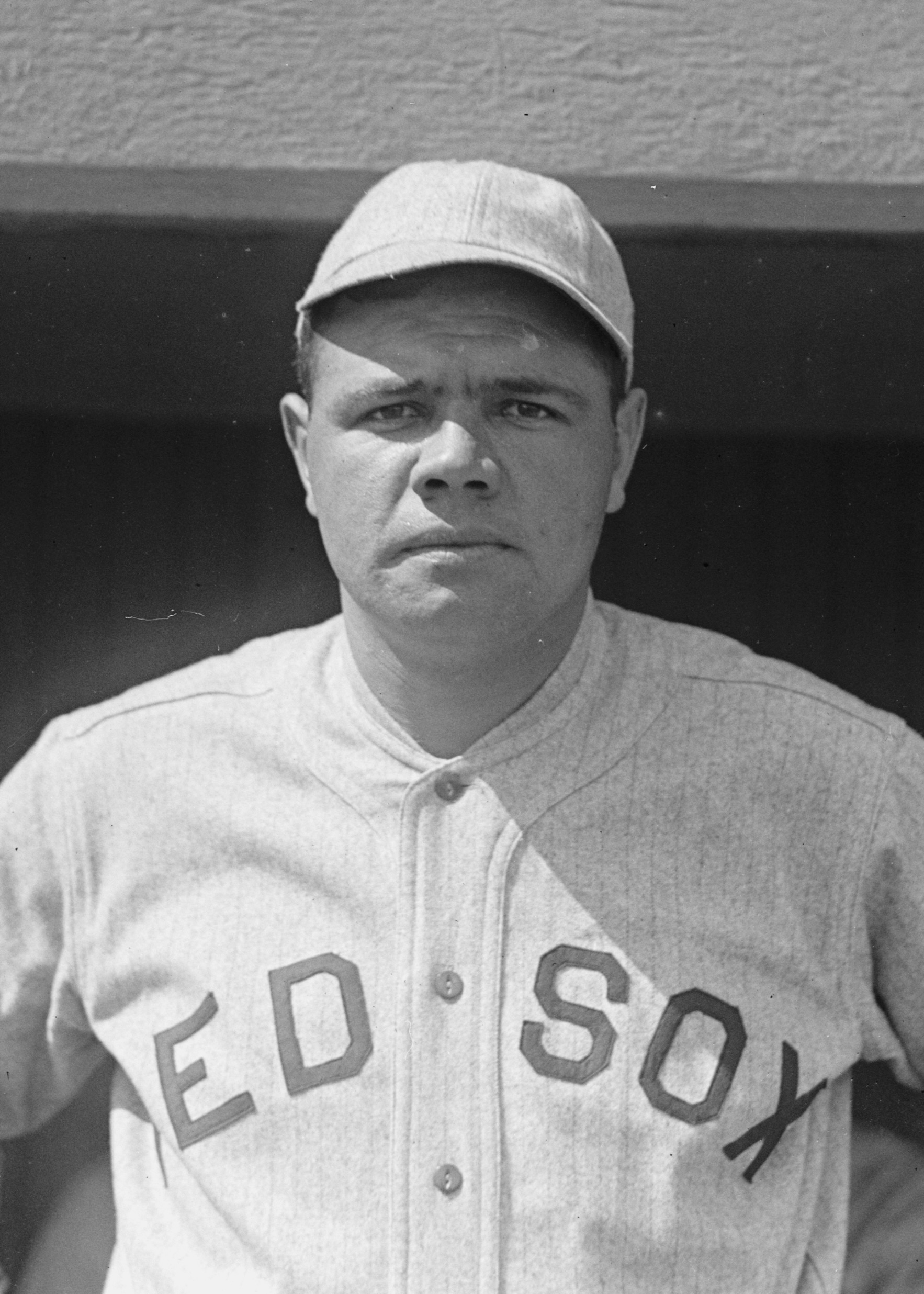 Babe Ruth wearing a Red Sox jersey