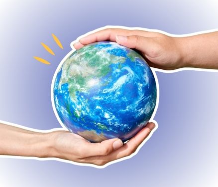 two hands holding Earth